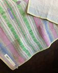 Kantha personal quilt in pastel striped pattern.