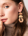 Gold stone chandelier earrings in beautiful sunstone and gold worn by model