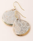 Large stone earrings in fossil coral dipped in gold.