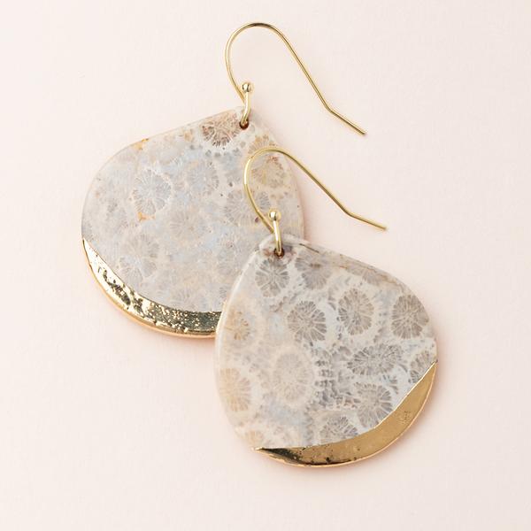 Large stone earrings in fossil coral dipped in gold.