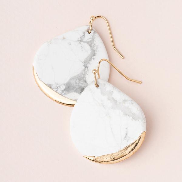 Large stone earrings in white howlite dipped in gold.