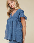 side view of women's lightweight top - blue v-neck with ruffle sleeve 