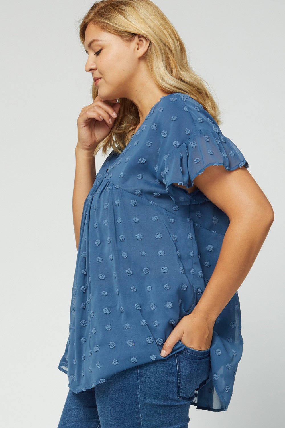 side view of women's plus size babydoll top - blue dot