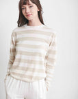 Women's tops for winter. Pale tan and white striped lightweight weater.