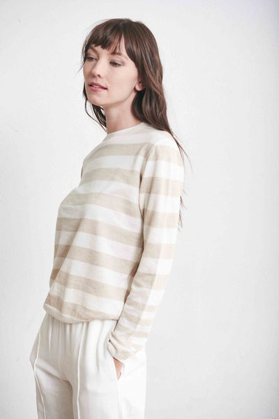 Side view of ultra-lightweight linen tan and white striped sweater.