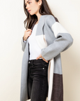 Womens bell sleeve cardigan side view.