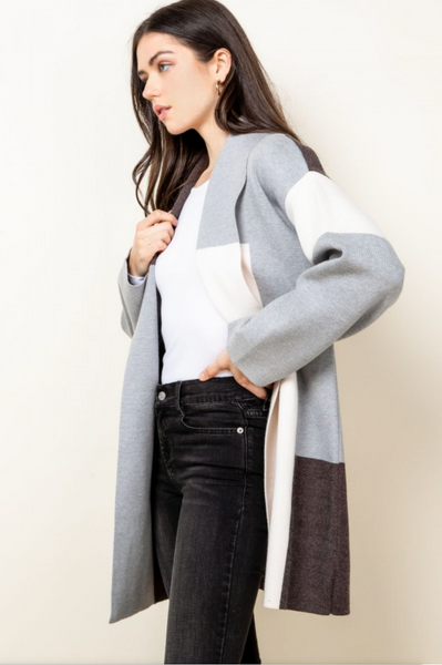 Womens bell sleeve cardigan side view.