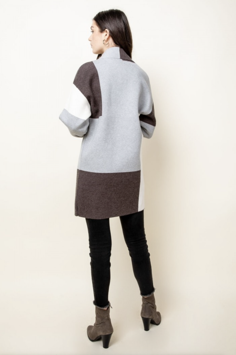 Womens bell sleeve cardigan back view.