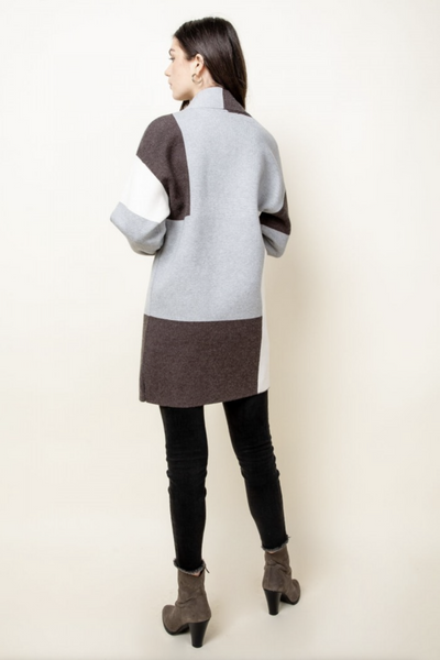 Womens bell sleeve cardigan back view.