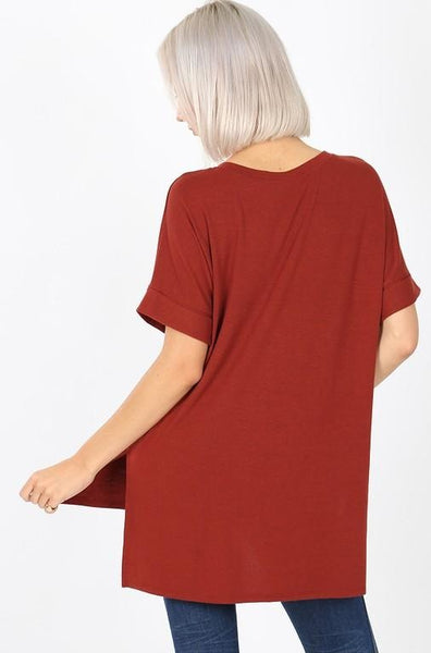 Back view of Women's basic tee with rolled short sleeves.