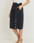 Belted paperbag waist skirt with pockets and tie detail.