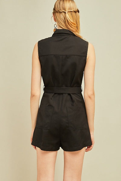 Black shorts romper outfit. Back view.