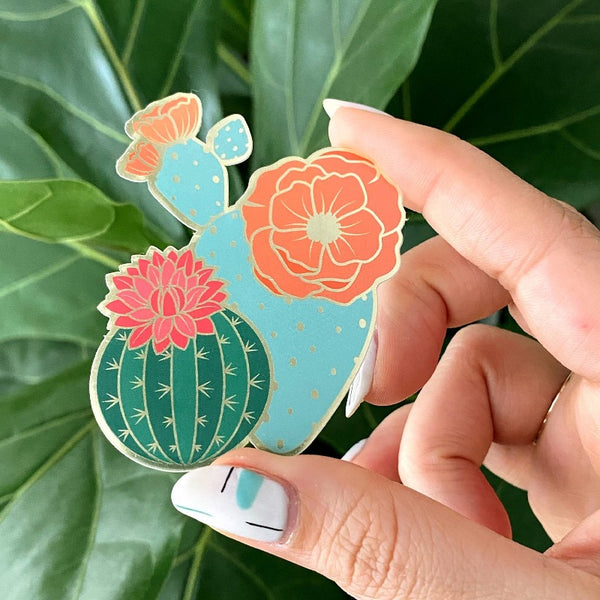 Model holding Blooming Cacti sticker.