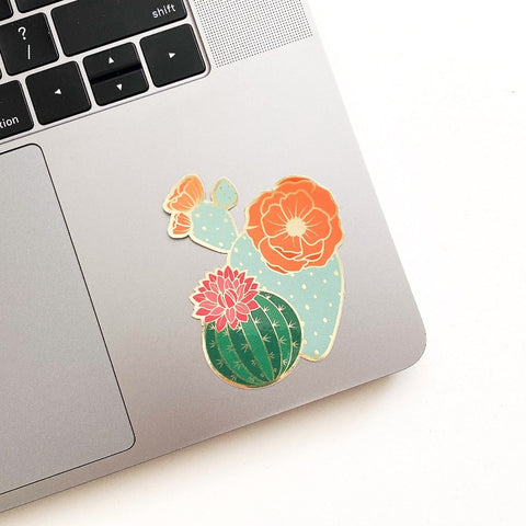 Cacti sticker shown on laptop.