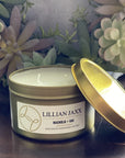 Candles for a good cause. Lillian Jaxx gold tin candle in Magnolia + Oak.