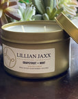 Candles for a good cause. Lillian Jaxx gold tin candle.