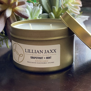 Candles for a good cause. Lillian Jaxx gold tin candle.