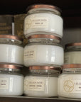 Candles that give back. Lillian Jaxx medium glass jar candles with copper lids.