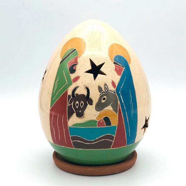 Ceramic luminaries in smaller size. Nativity with animals.