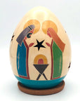 Ceramic luminaries in smaller size. Nativity with Mary, Joseph, and baby.