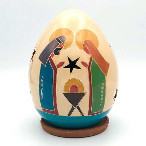 Ceramic luminaries in smaller size. Nativity with Mary, Joseph, and baby.