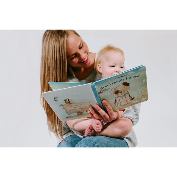 Children's book about best friends being read to baby by mother.