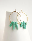 Coloured stone hoop earrings.