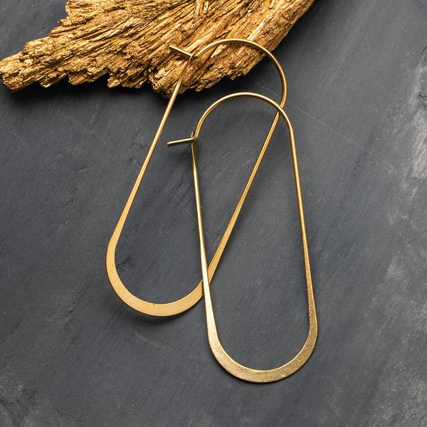 Unique lightweight hoop earrings in gold.