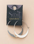 Lightweight hoop earrings on leather, gold stamped display card.