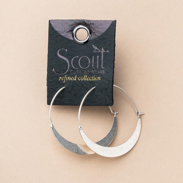 Lightweight hoop earrings on leather, gold stamped display card.