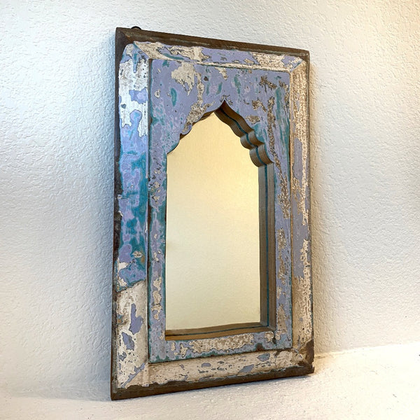 White and pastel decorative wooden mirror made from antique wood.