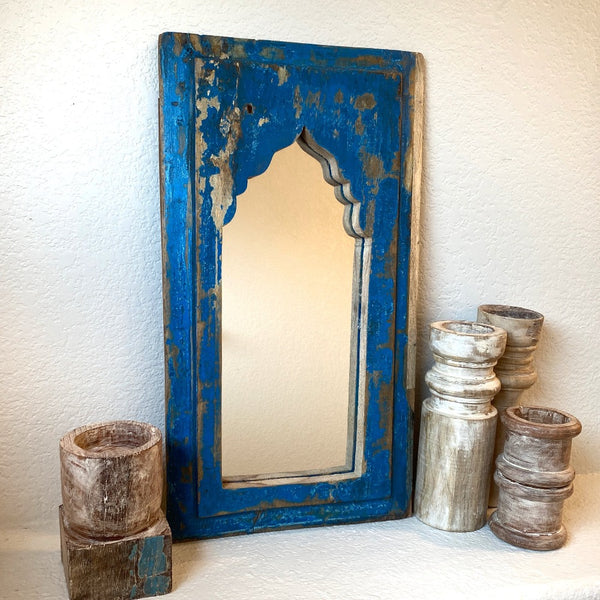 Blue antique decorative wooden mirror.