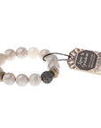 Essential oils diffuser bracelet in champagne colored gemstones with lava diffuser bead.