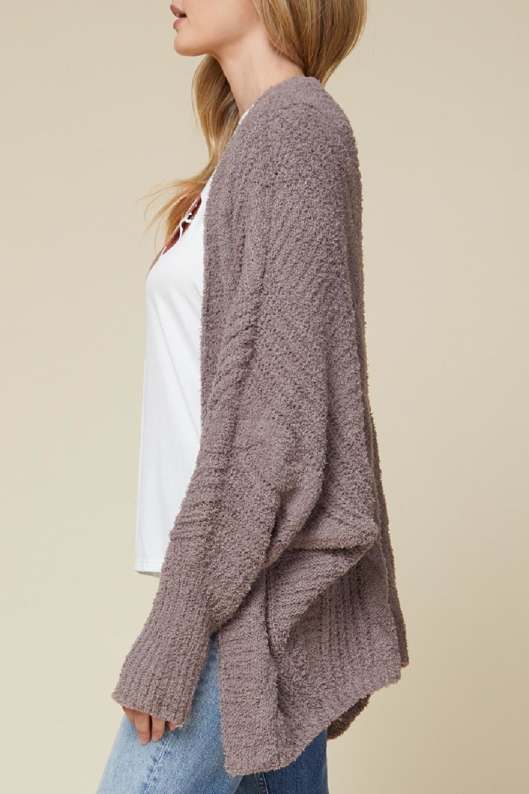 Side view of mocha colored soft dolman sleeve cardigan.