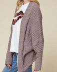 Oversized women's super soft cardigan in mocha side view.