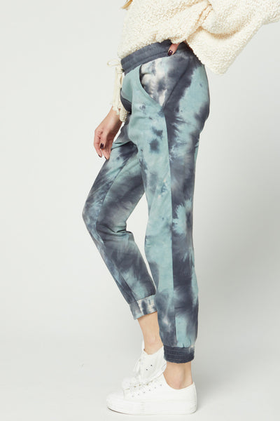Side view of cute women's tie dye lightweight jogger with pockets.