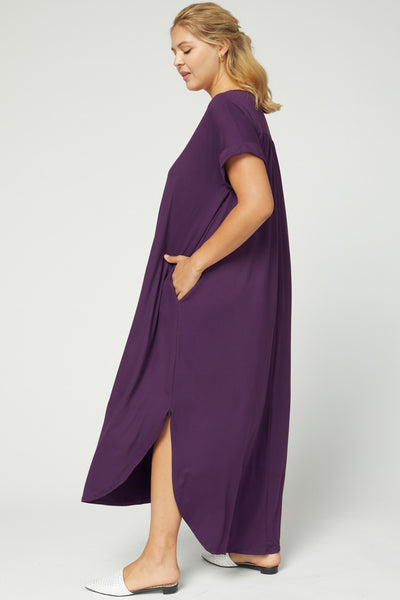 Side view of Women's Boutique Plus Size Dress - Plum v-neck maxi with pockets