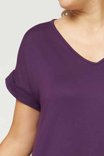 Close up of Women's Boutique Plus Size Dress - Plum v-neck with rolled short sleeves