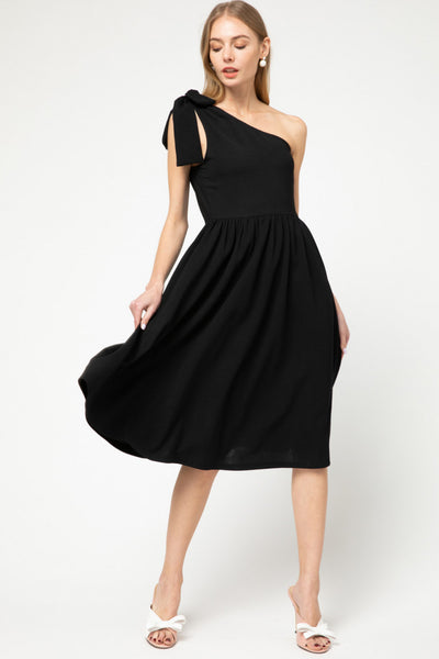 One shoulder, fit and flare knit little black dress in midi length.