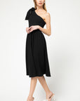 One shoulder, fit and flare knit little black dress in midi length with cute accessories.