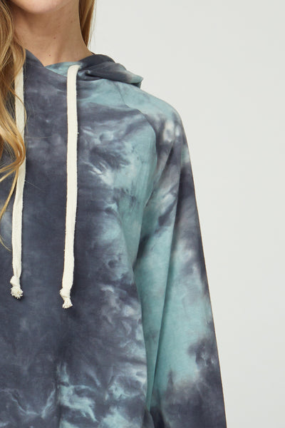 Close up of lightweight tie dye pullover with drawstring hood.