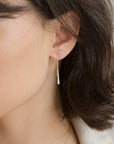 Model wearing Minimalist Style Gold Earrings for Women in hammered ear threads.