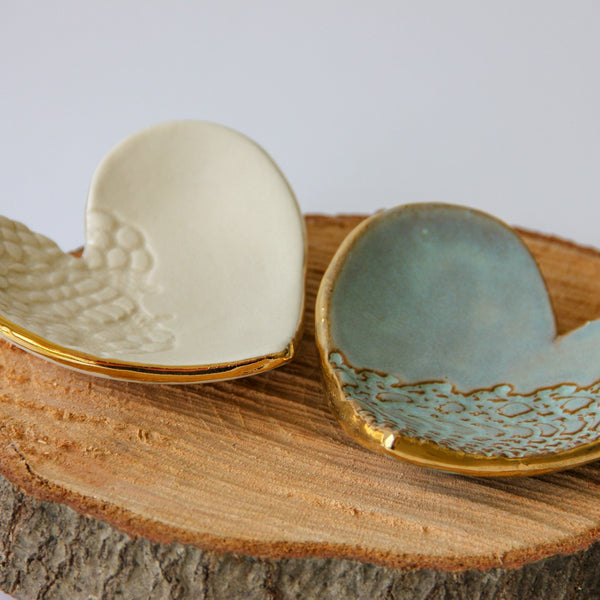 Handmade clay heart ring dish with gold leaf edge detail.