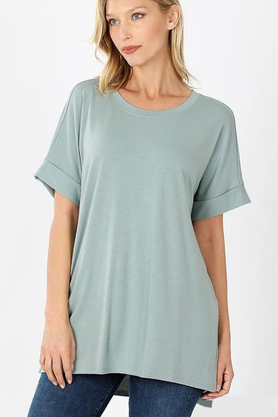 Women's basic tee in light green with rolled short sleeves.