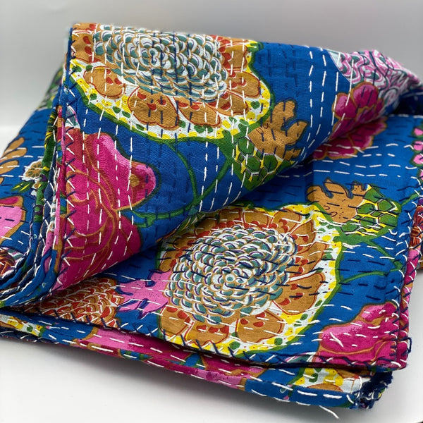 Lightweight queen size quilts in floral pattern in kantha style.