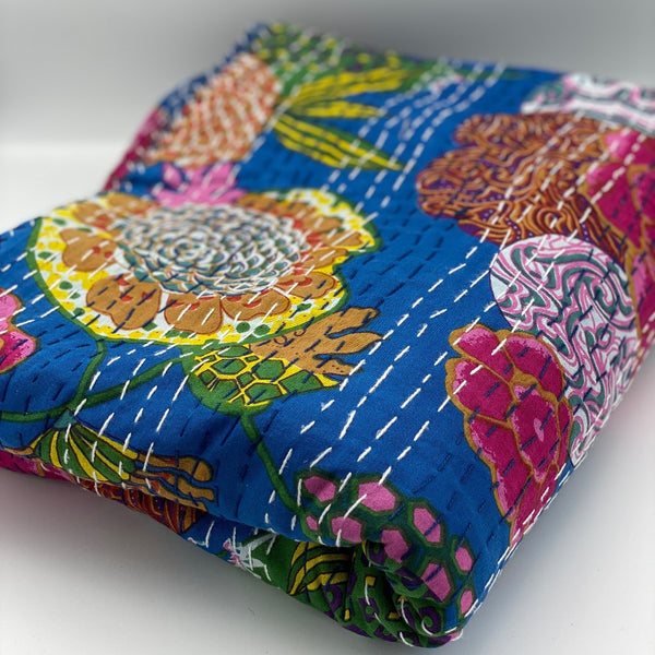 Floral patterned lightweight queen size quilts.