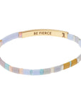 Miyuki bracelets with colorful glass beads in lavender with "be fierce" engraved on inside of gold bar.