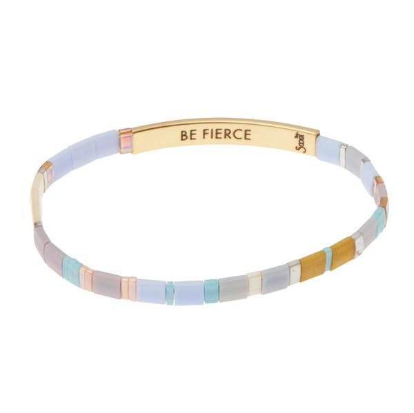 Miyuki bracelets with colorful glass beads in lavender with "be fierce" engraved on inside of gold bar.
