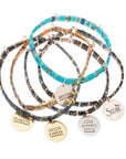 Tortoise shell bracelets. Stack of miyuki bracelets with charm engraved with good intentions.