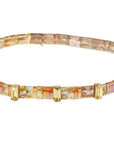 Tortoise shell bracelets with rhinestones and gold charm.